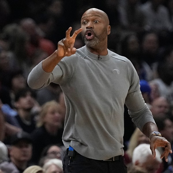 Orlando Magic head coach Jamahl Mosley gestures in the first half of Game 7 of an NBA basketball first-round playoff series against the Cleveland Cavaliers, Sunday, May 5, 2024, in Cleveland. (AP Photo/Sue Ogrocki)