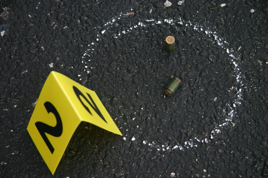 a close up of a street sign on the ground