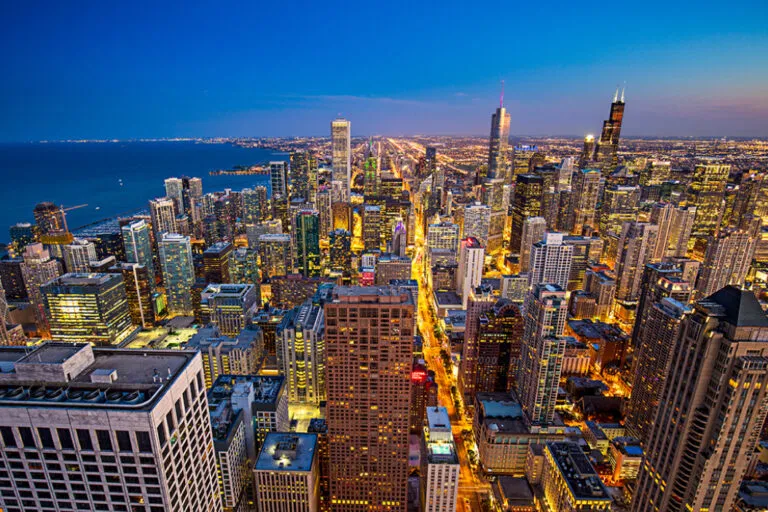 an aerial view of a city at night