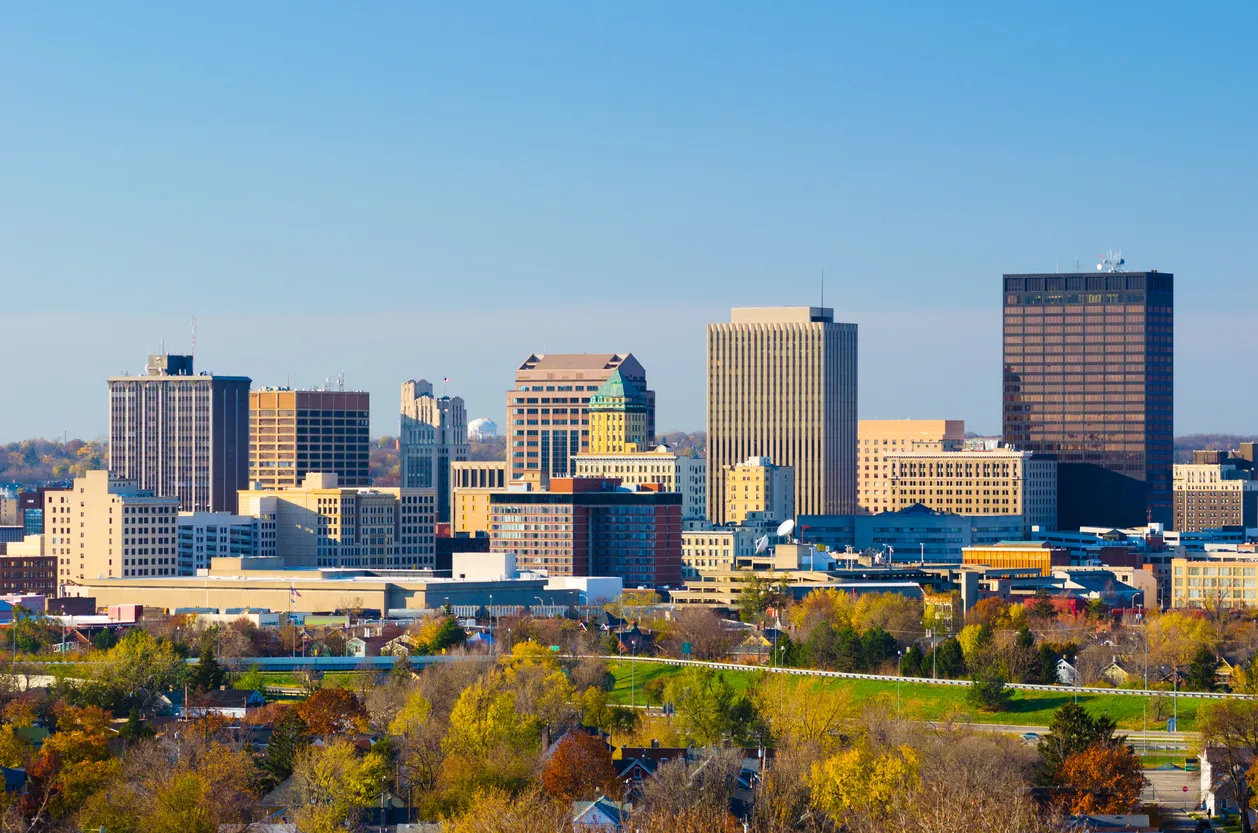 a view of a city with tall buildings